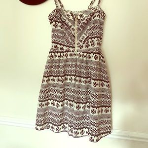 Black & white geo print zipper mini dress.